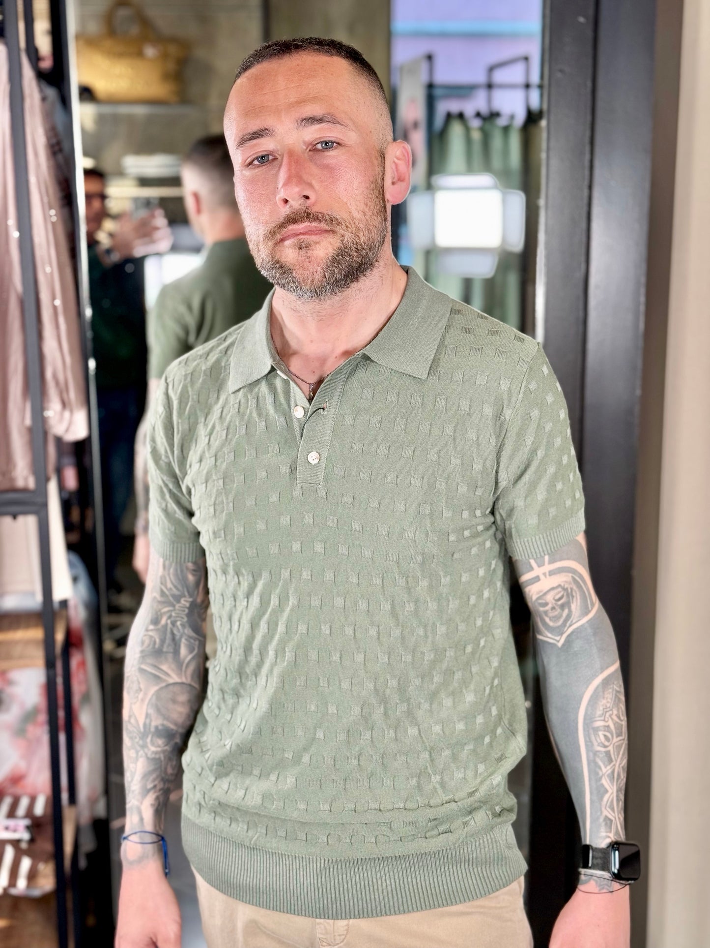 Polo in maglia verde con rombi tono su tono 181