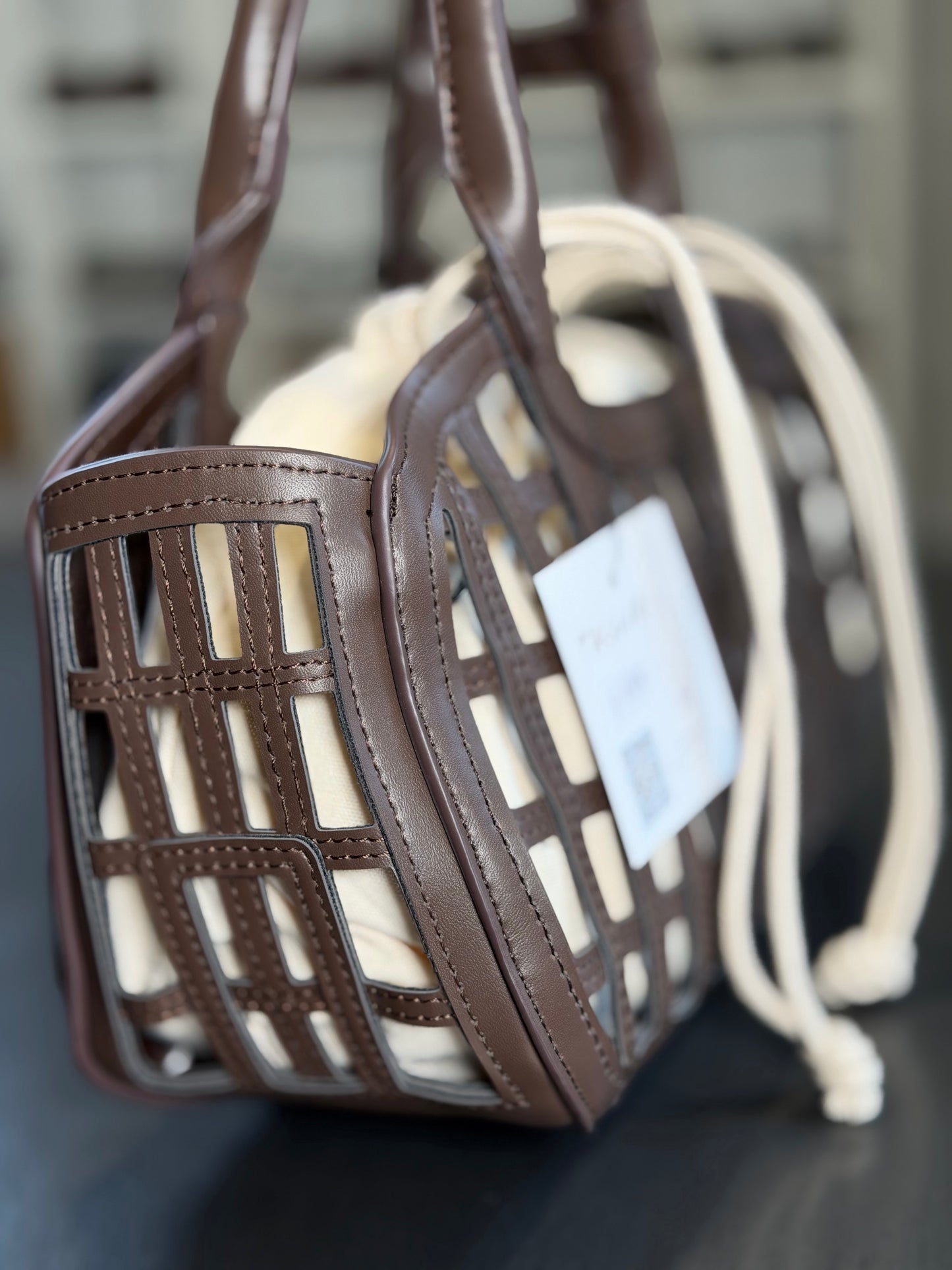 Mini bag traforata marrone con sacca all’interno 2199