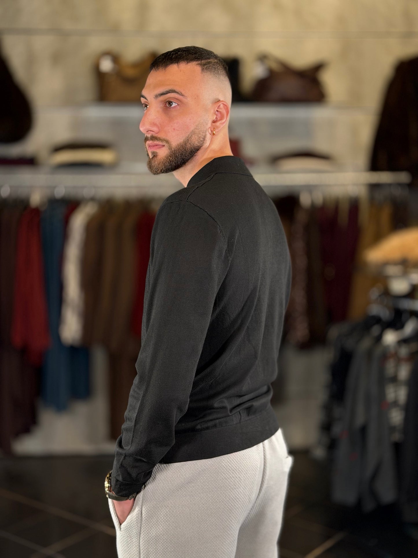 Polo in maglia con trama tono su tono nera 2479