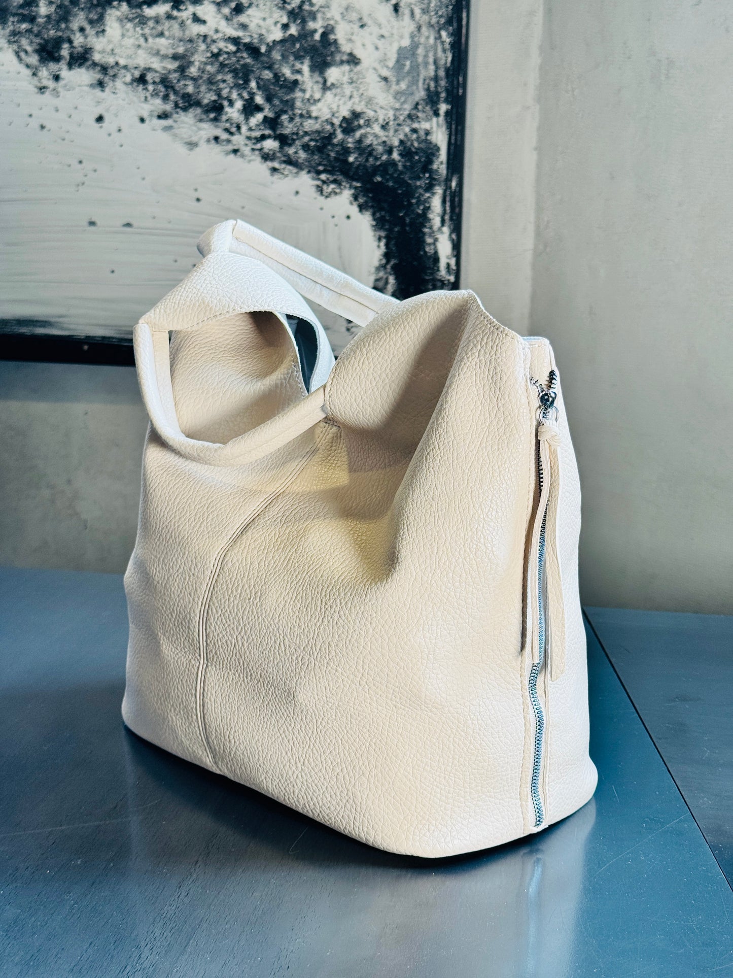 Borsa a sacca burro con tracolla all’interno 265