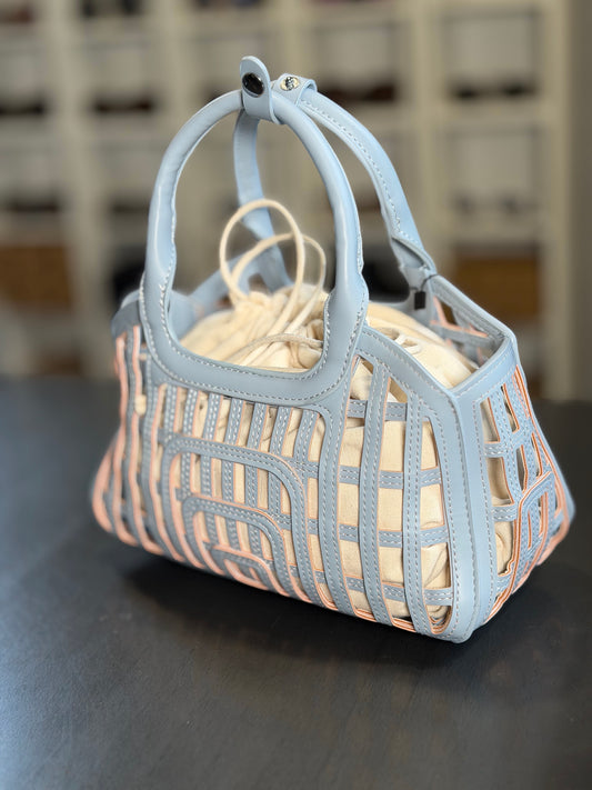 Mini bag traforata azzurra con sacca all’interno 2200