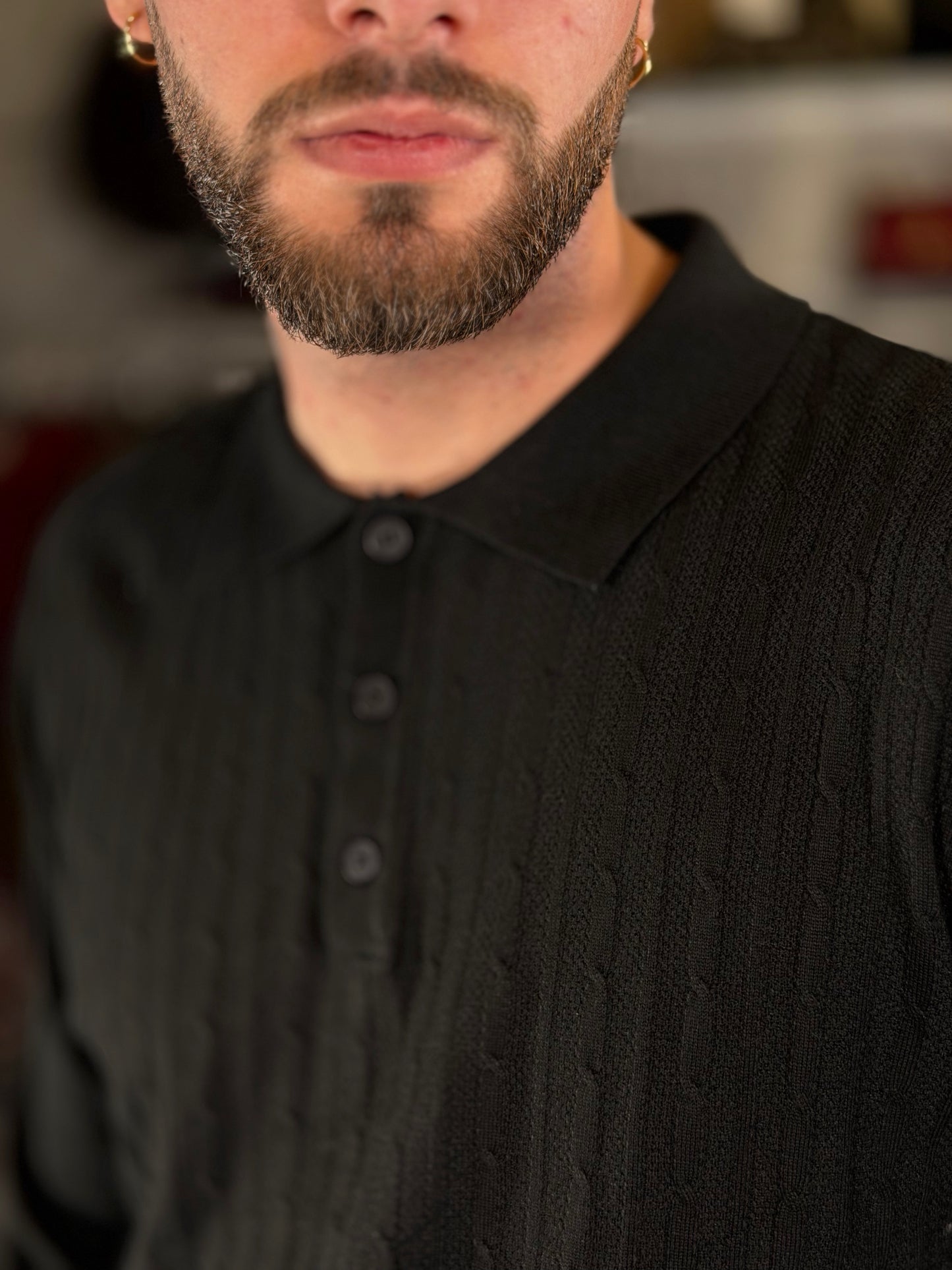 Polo in maglia con trama tono su tono nera 2479