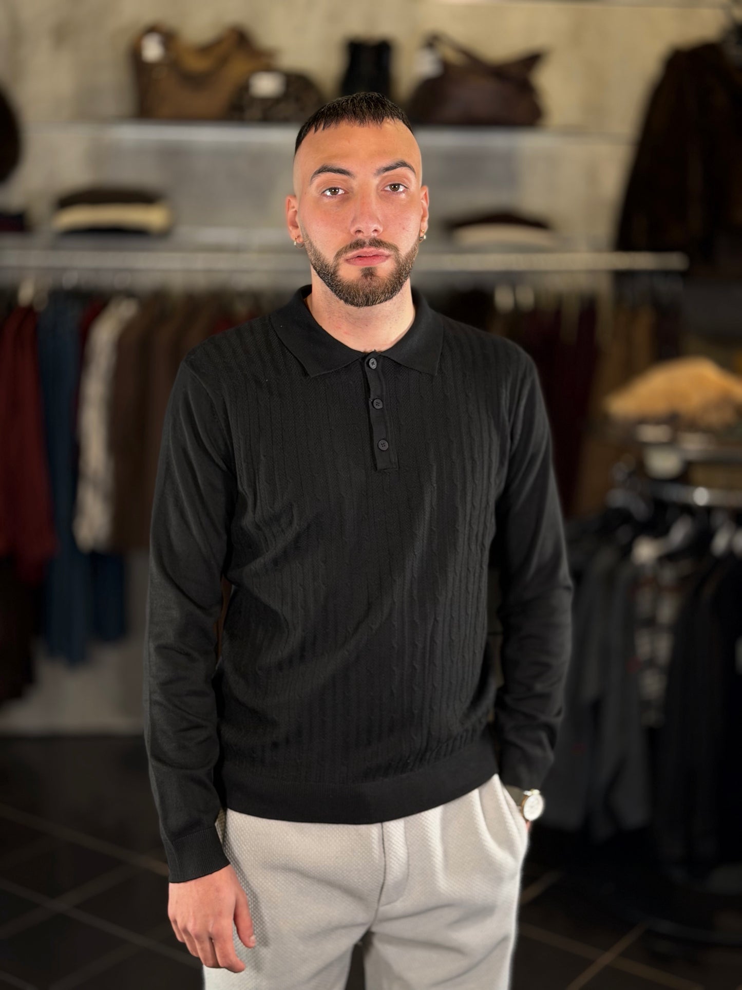 Polo in maglia con trama tono su tono nera 2479